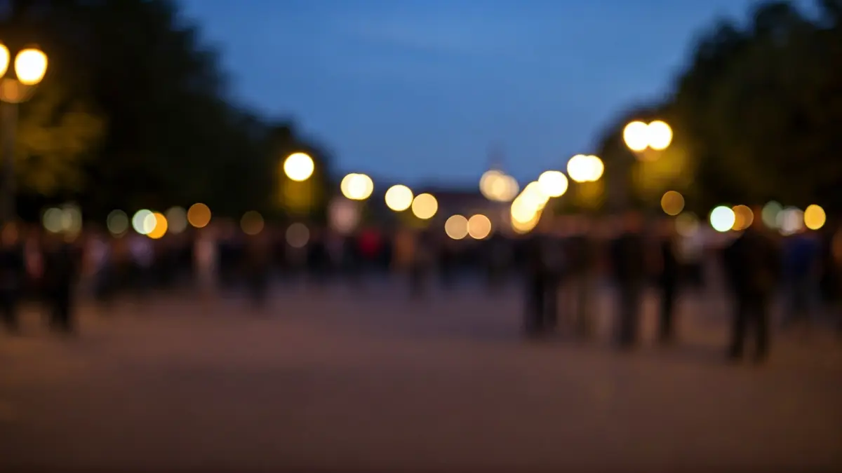 Generic image of a public square or park with low public attendance at dusk.