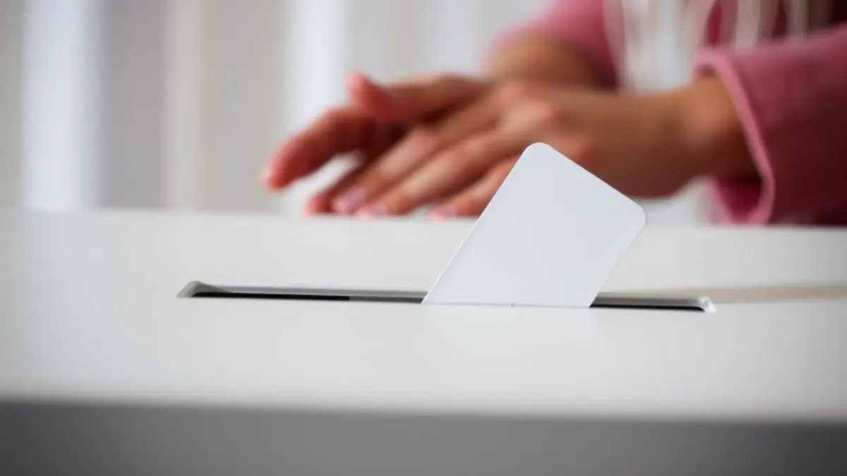 Generic image of a ballot box during a voting process.