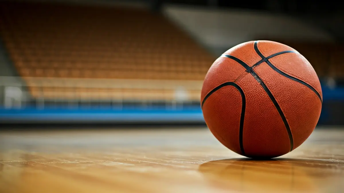 Generic image of a basketball on a court.