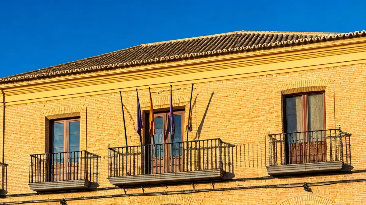 Andalusian town hall facade under the sun.