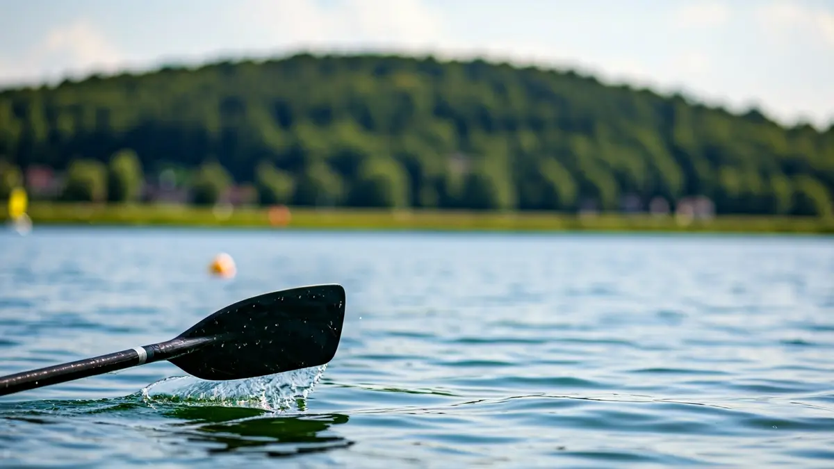 Generic image of a canoeing paddle in water.