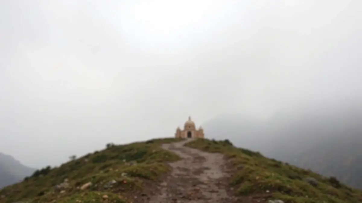Image of a path leading to a sanctuary on a hazy day with potential rain.