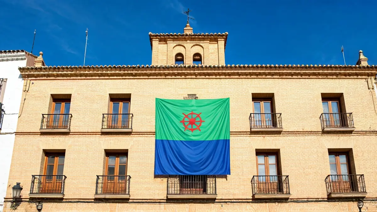 Romani flag flying on the facade of an Andalusian town hall.