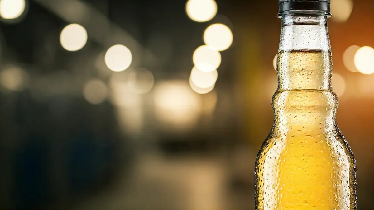 Generic image of a refreshing drink bottle, highlighting recycled material.