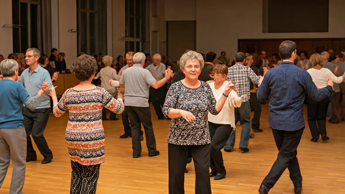 Seniors and young adults dancing Latin rhythms in a university workshop.
