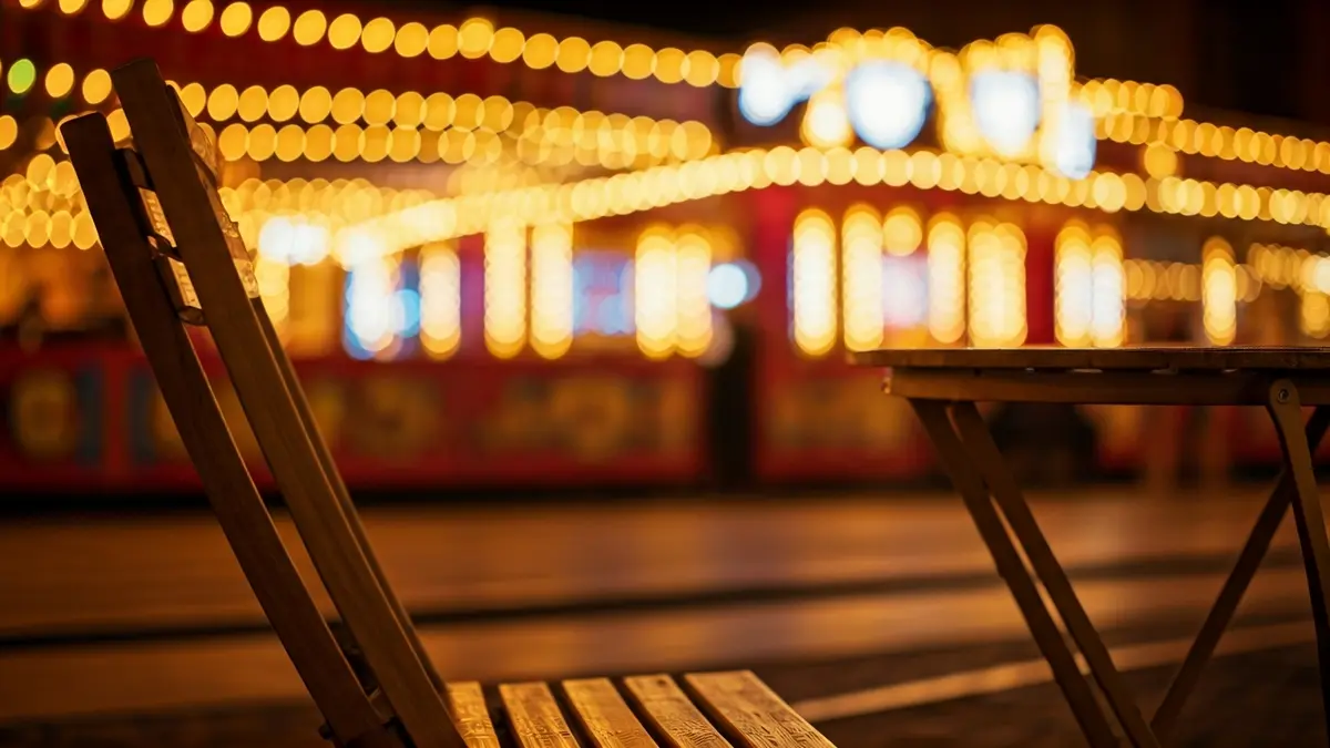 Generic image of fair booth furniture, with wooden chairs and tables.