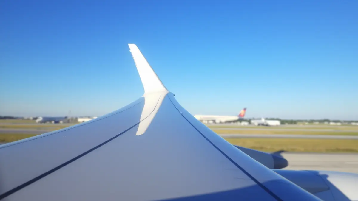 Generic image of an airplane at an airport, symbolizing air connectivity.
