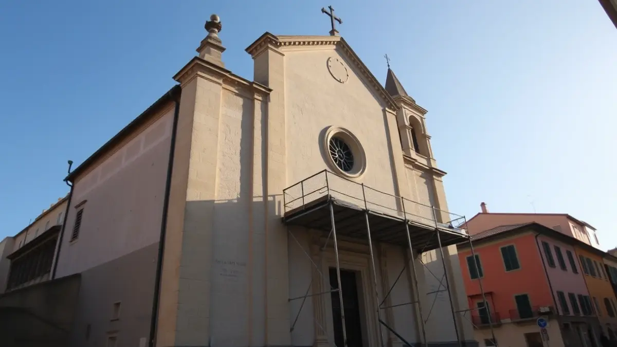 Image of the facade of a historic church in Cuevas del Almanzora with scaffolding.