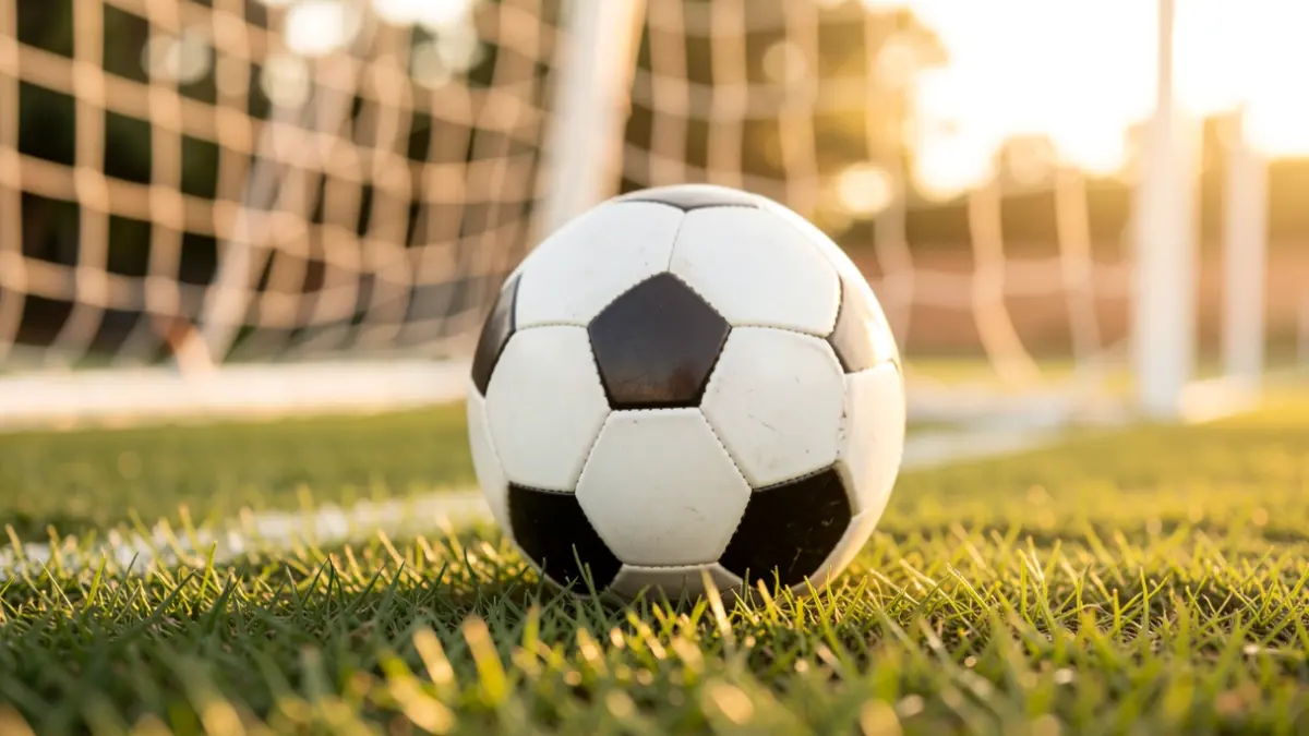 Generic image of a soccer ball on grass.