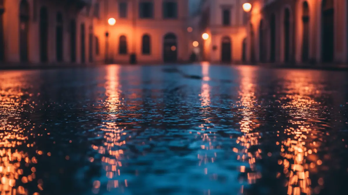 Generic image of emergency lights reflected on wet asphalt at night.