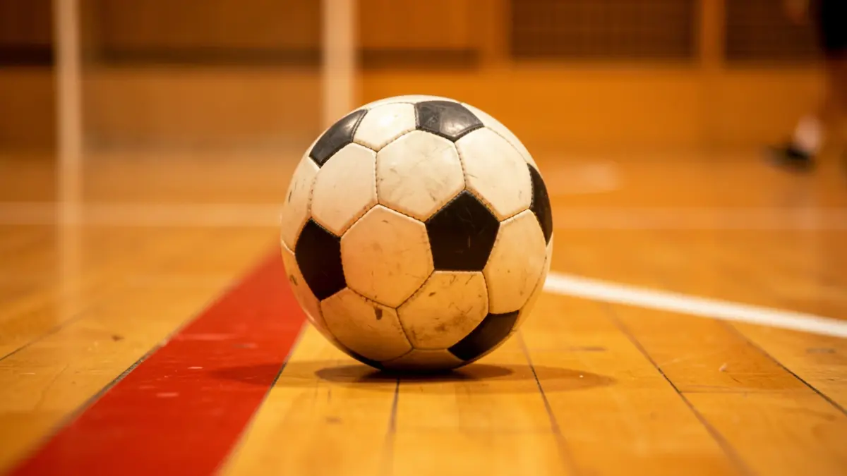 Generic image of a futsal ball on a court.