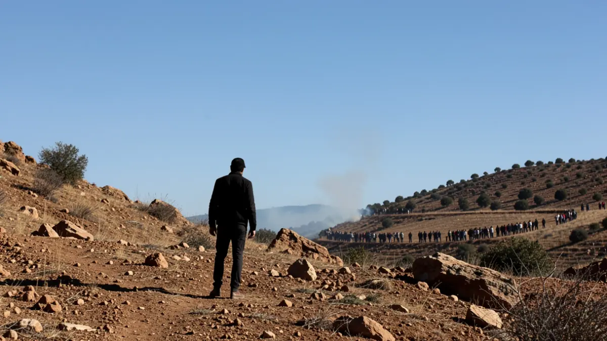 Generic image of a rocky hillside in Andalucía with distant smoke.