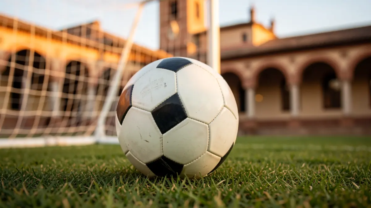 Generic image of a soccer ball on a stadium's grass field.