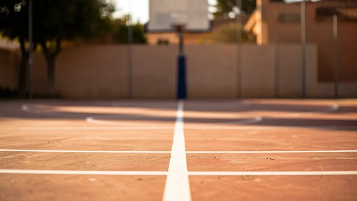 Basketball court in Andalucía with afternoon light.
