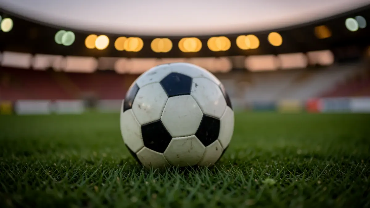 Generic image of a soccer ball on grass.