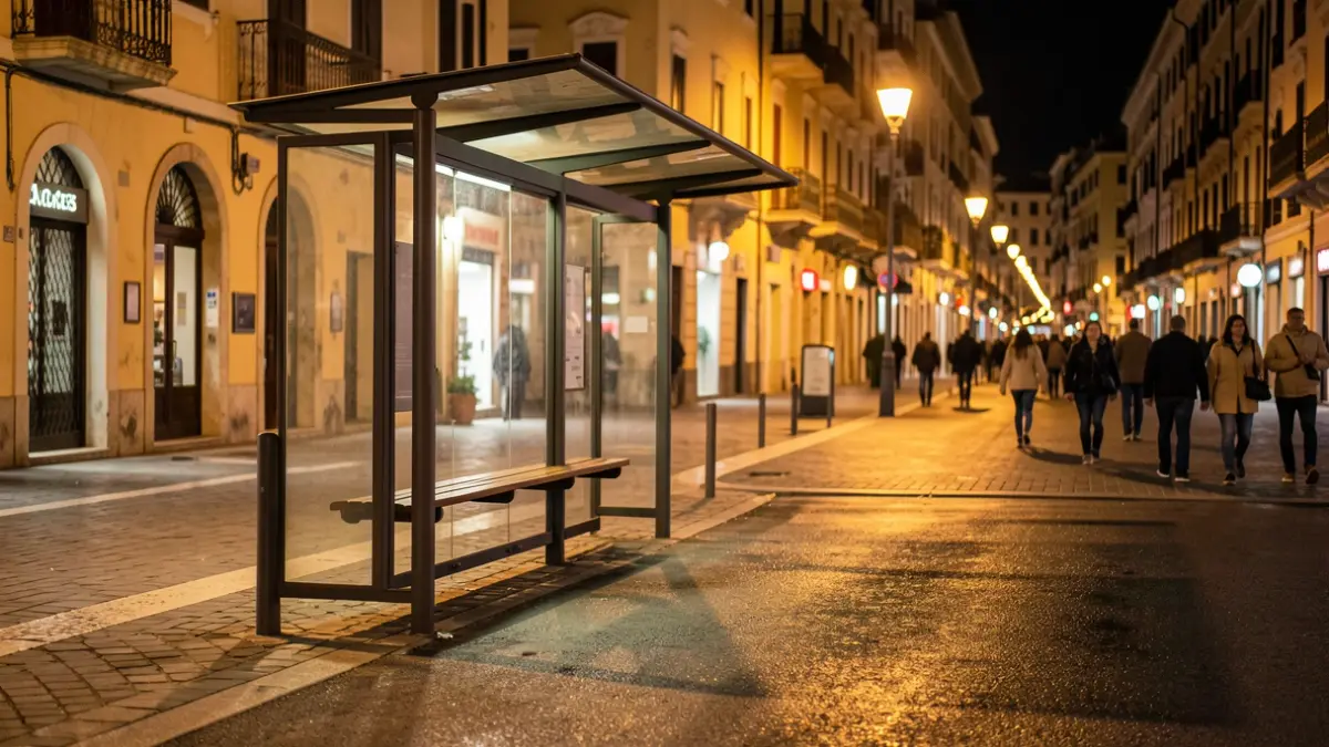 Generic image of an urban bus stop at night.