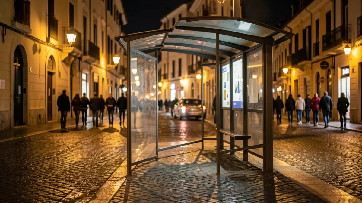Generic image of an empty urban bus stop at dusk.