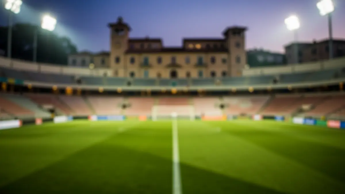 Generic image of an empty football stadium at dusk.