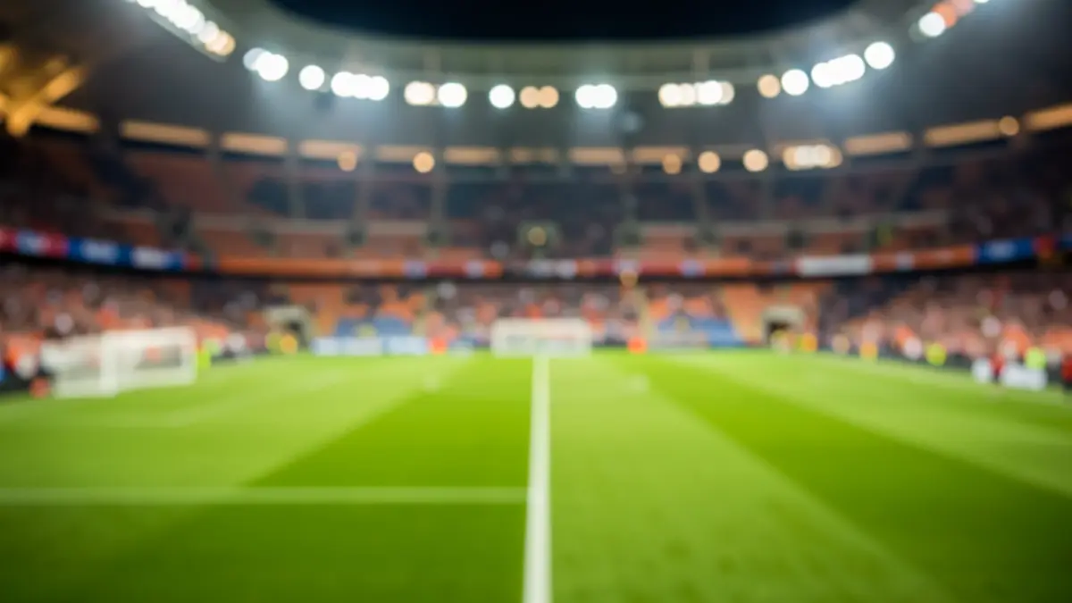 Generic image of a football stadium interior with blurred pitch and stands.