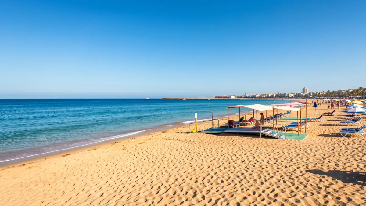 Generic image of an accessible beach in Andalusia with an assisted bathing area.