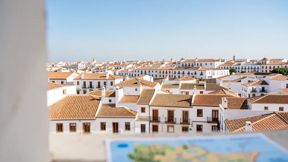 Panoramic view of Jerez de la Frontera, Andalusia, with white buildings and terracotta roofs under a sunny sky.