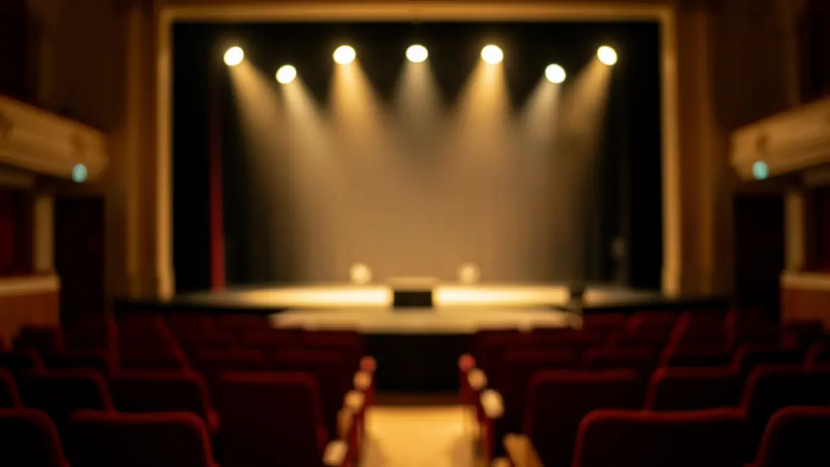 Generic image of a folklore festival stage with warm lights and empty chairs.