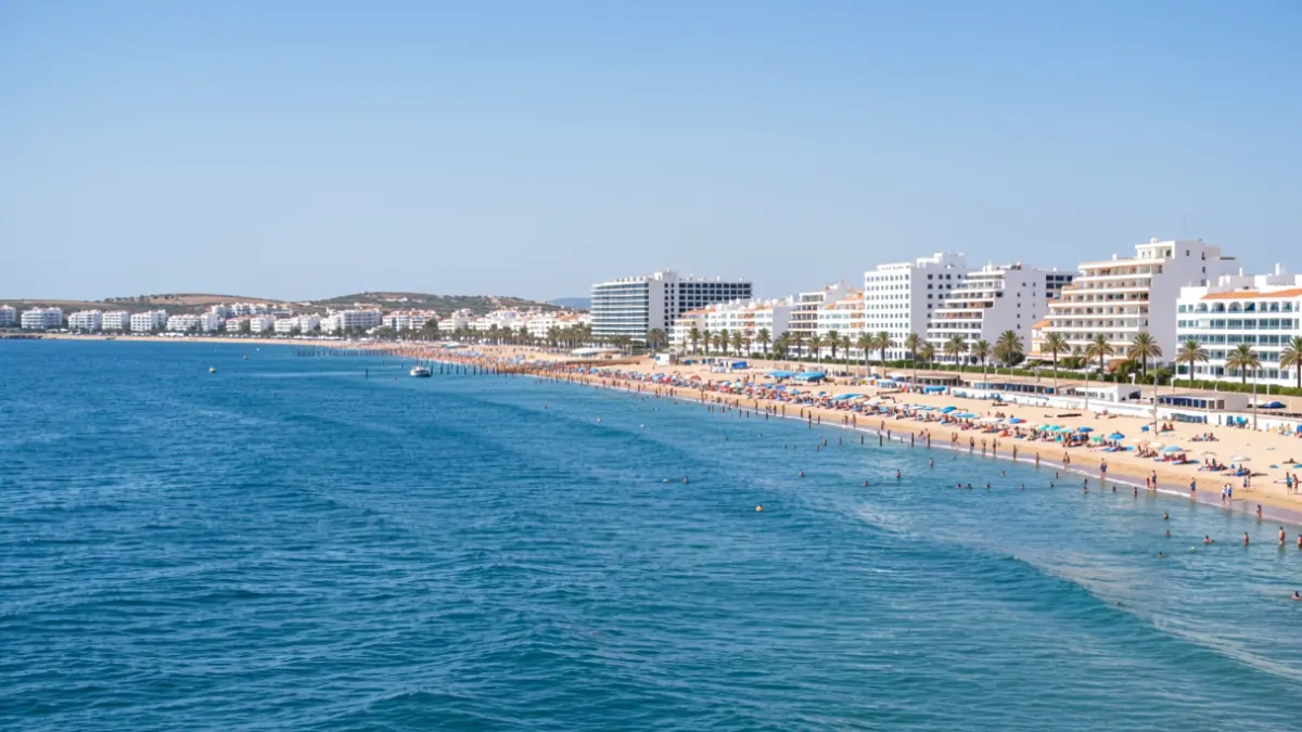 Panoramic view of the Chiclana coast with beach and hotels.