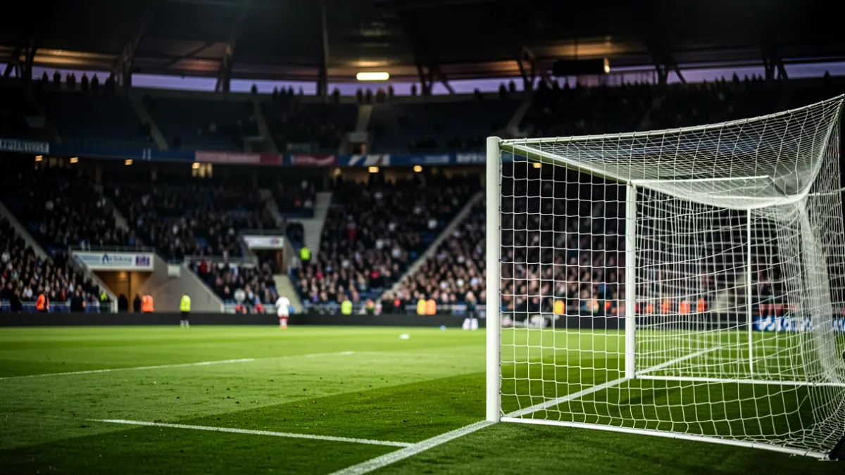 Generic image of an empty football stadium at dusk.