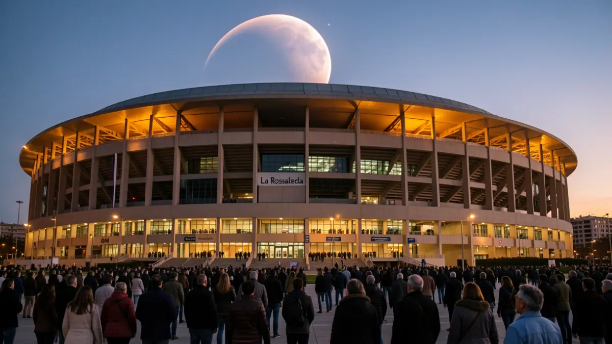 La Rosaleda stadium in Málaga at dusk, with hints of a solar eclipse.