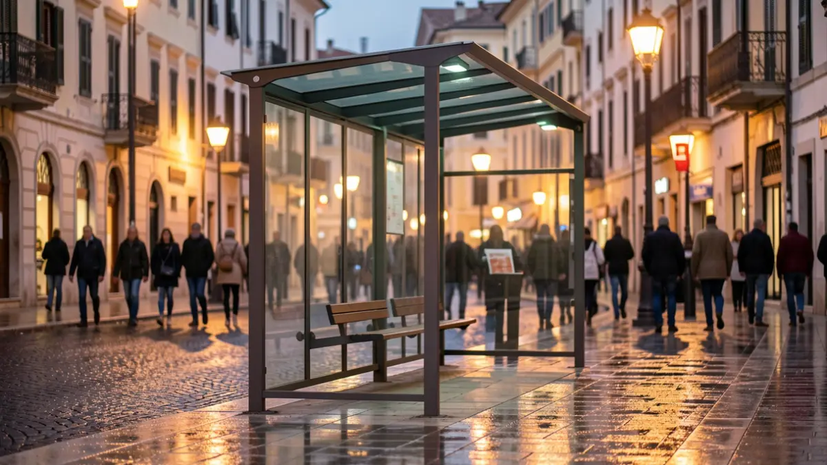 Generic image of a bus stop in a Mediterranean city at dusk.