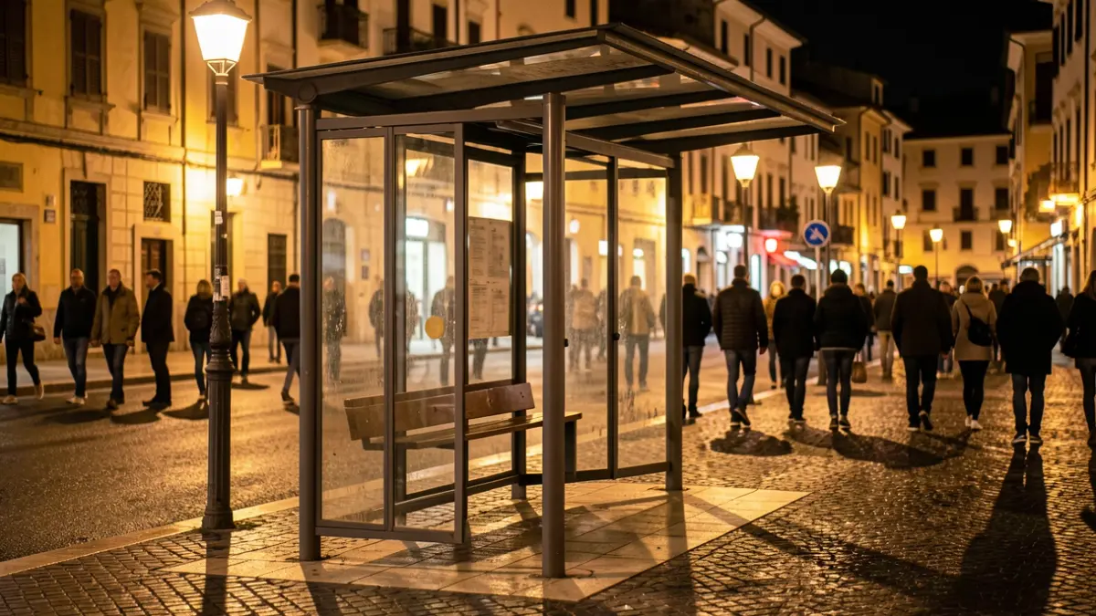 Empty bus stop at night in an Andalusian town.